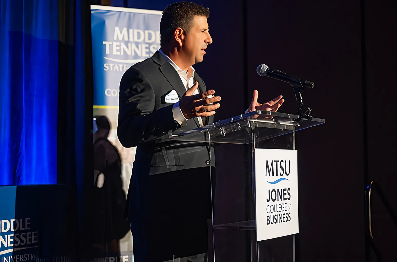 John Cipriano speaking at a business event