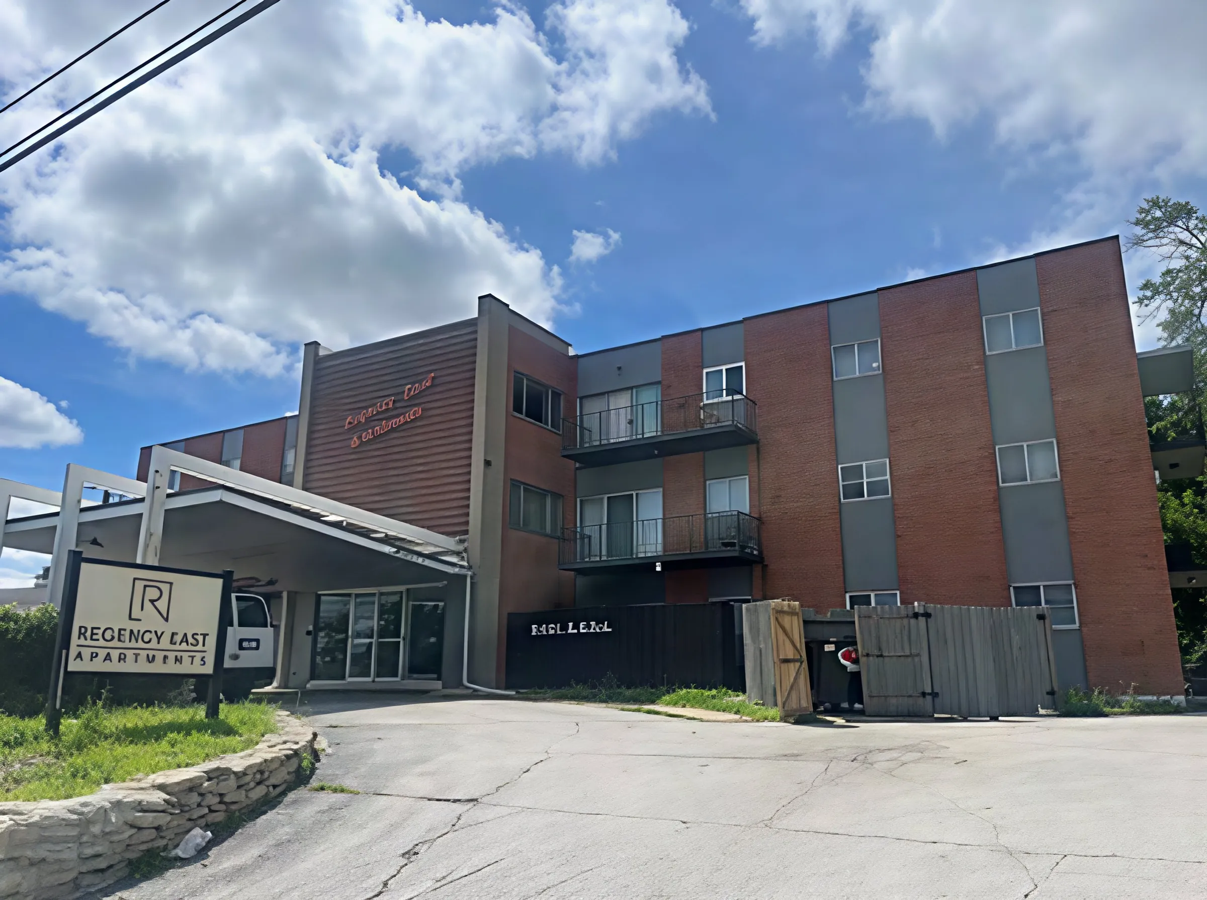 Brick multifamily apartment building in Raytown, Missouri.